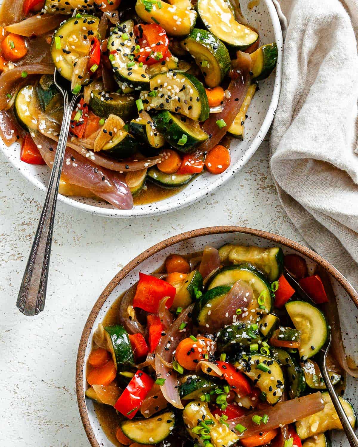 completed Easy Zucchini Stir Fry in two separate bowls
