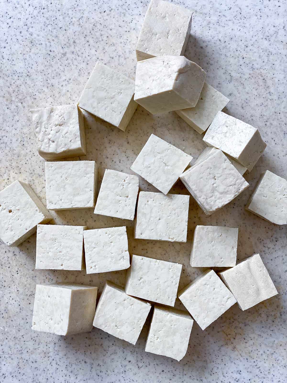 Cut up tofu into bite-sized 1-inch cubes.