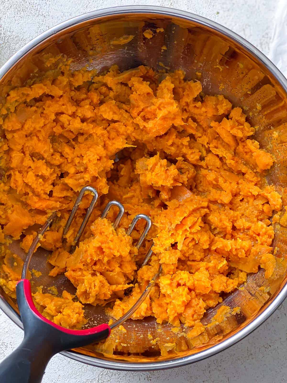 Cooked and mashed sweet potatoes.