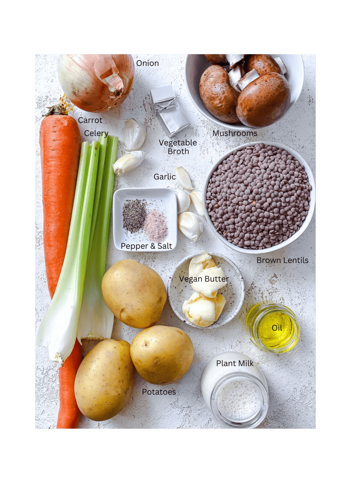 ingredients for Vegan Lentil Shepherd's Pie measured out against a white surface