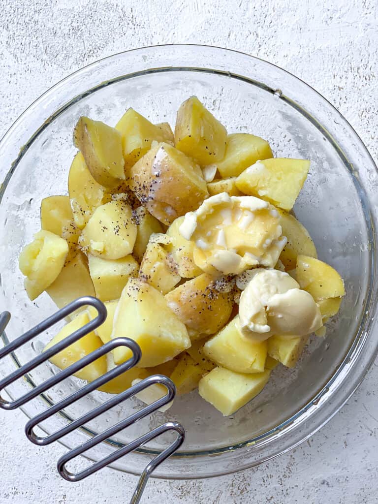 potatoes and vegan butter in bowl