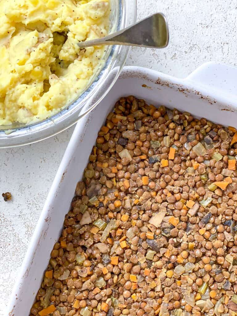 ingredients for Vegan Lentil Shepherd's Pie measured out a،nst a white surface