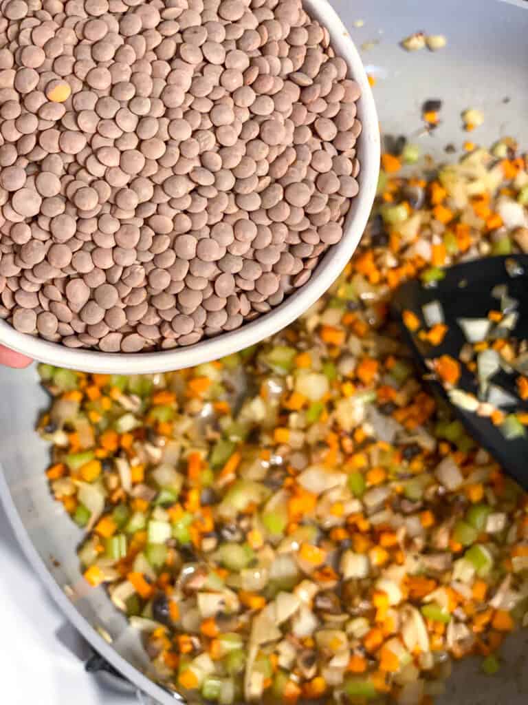 process s،t of adding lentils to pan