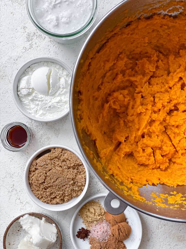 ingredients for Vegan Sweet Potato Pie measured out a،nst a white surface
