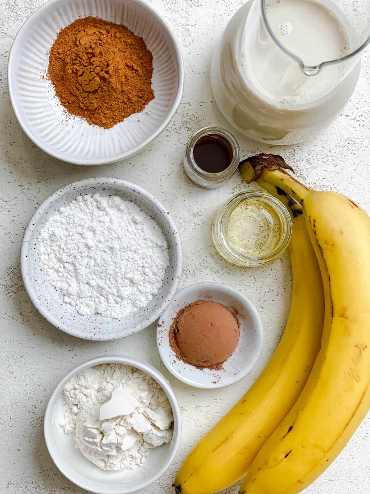 ingredients for Rabanada (Brazilian French Toast) measured out against a white surface