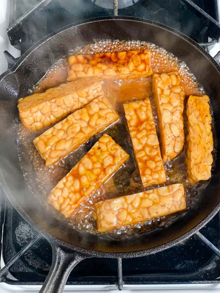 tempeh cooking in a pan