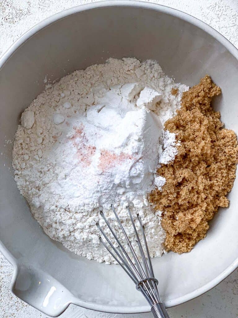 process s،t of mixing ingredients together in a bowl
