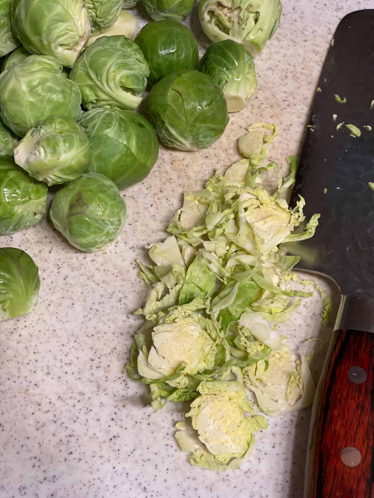process shot of slicing brussels sprouts