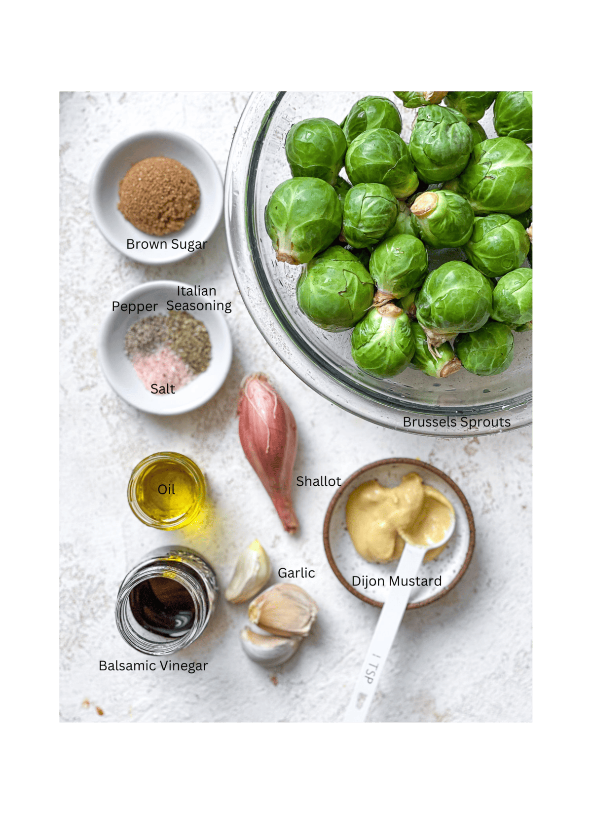 ingredients for Caramelized Brussels Sprouts measured a،nst a white surface