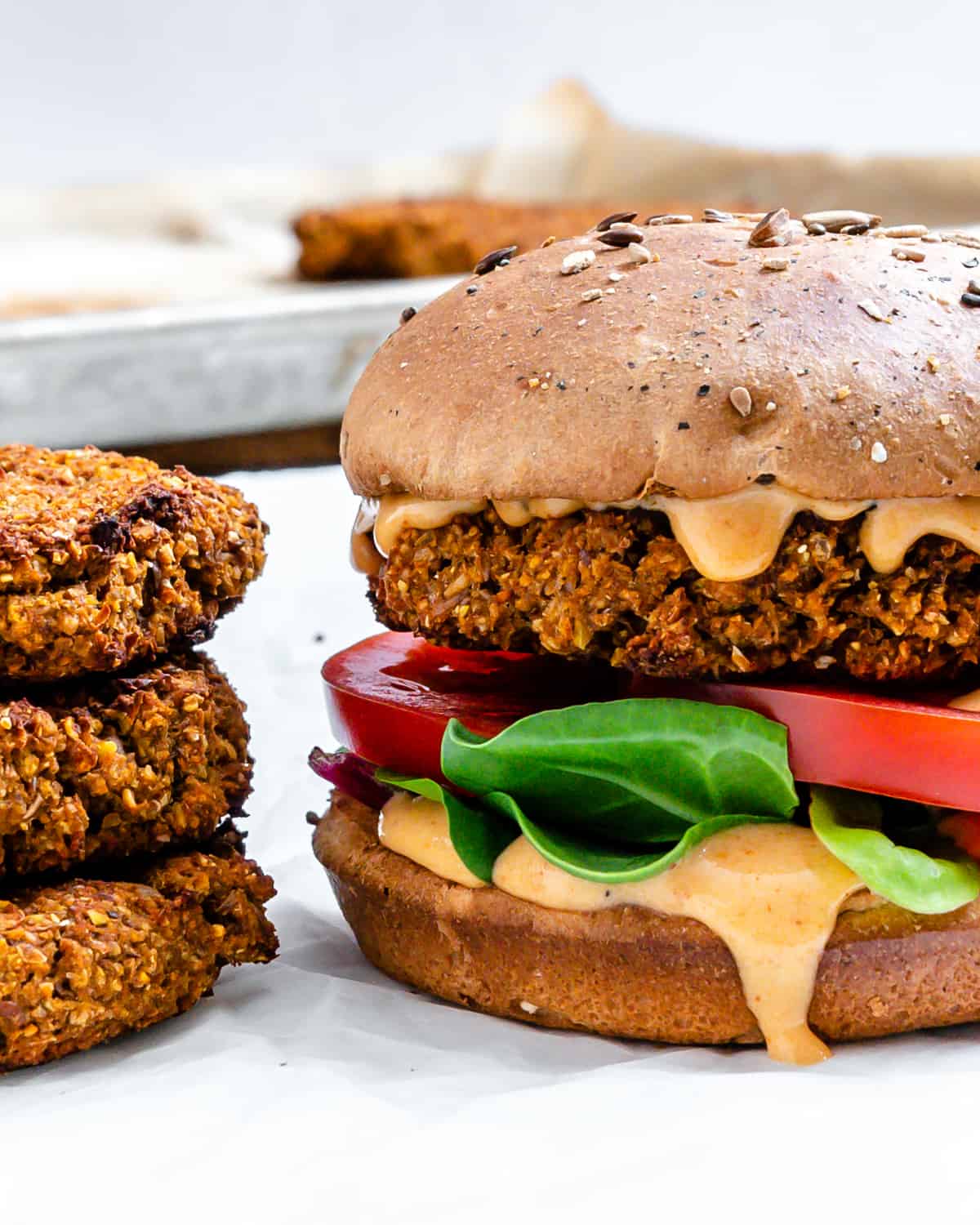 completed The Best Vegan Lentil Burgers on a white surface