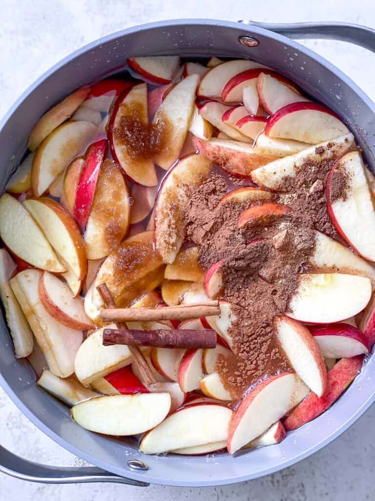 ،es added to bowl of apples