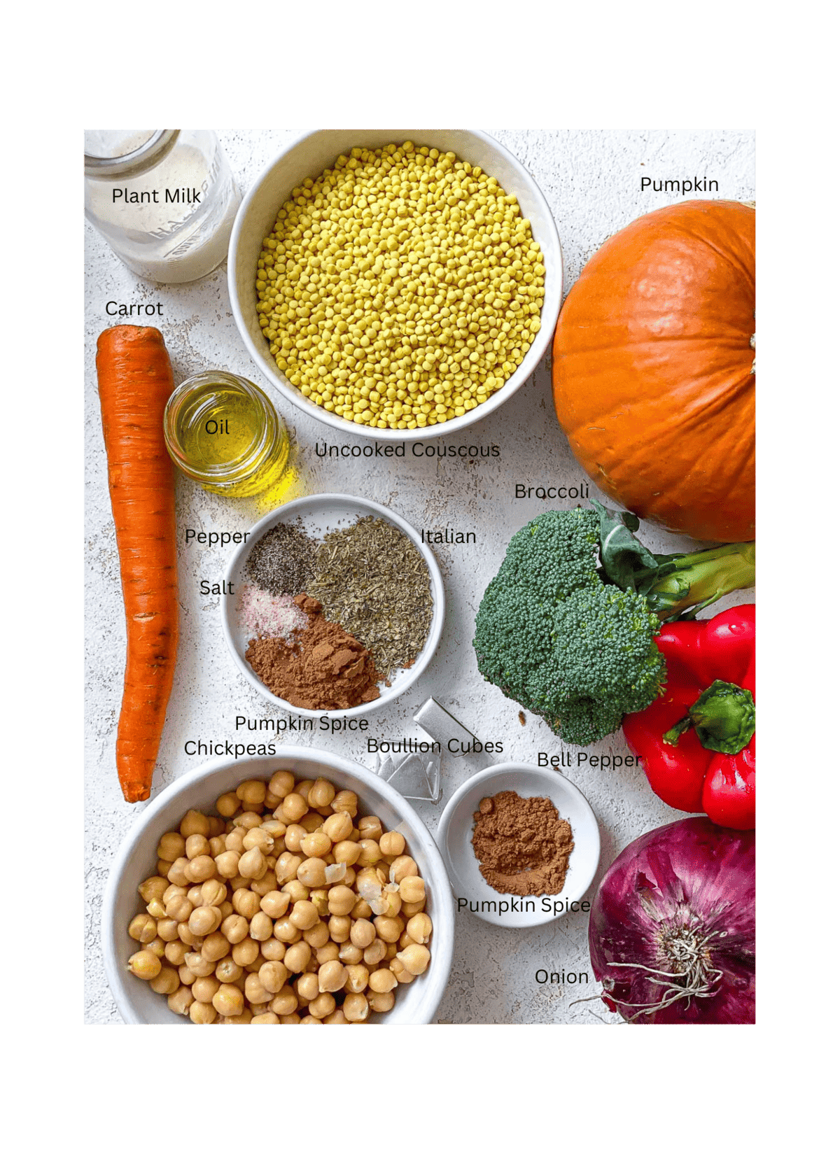 ingredients for Roasted Pumpkin Couscous Salad [Hot or Cold] on a white surface