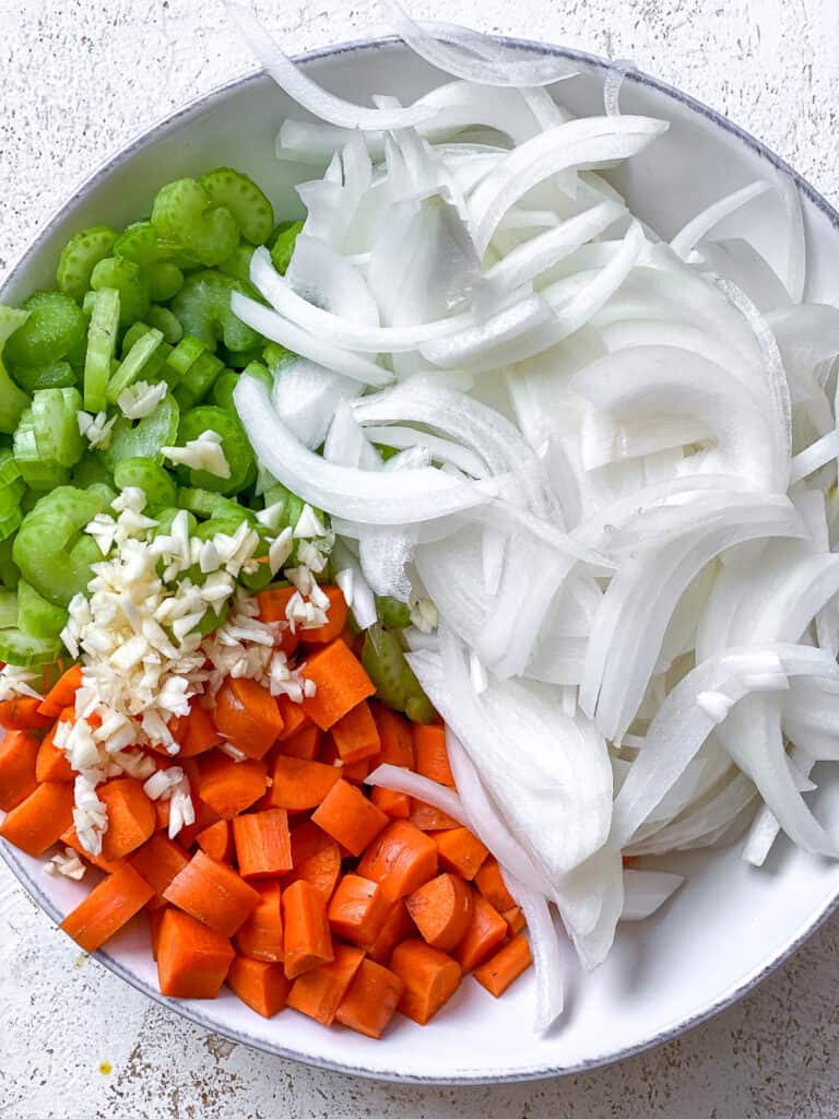 sliced vegetables on a white surface