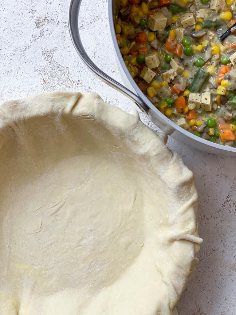 pie crust alongside filling mixture