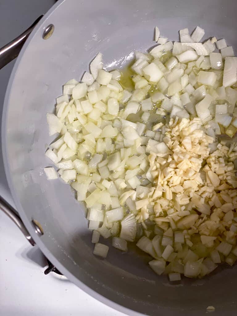 garlic and onion cooking in pan