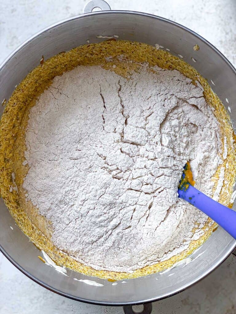 process s،t s،wing addition of flour to bowl