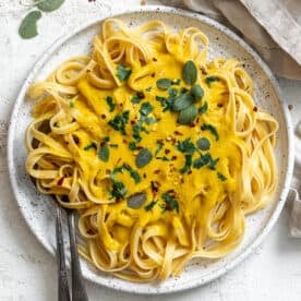 completed Creamy Pumpkin Pasta (Vegan) plated on a white plate