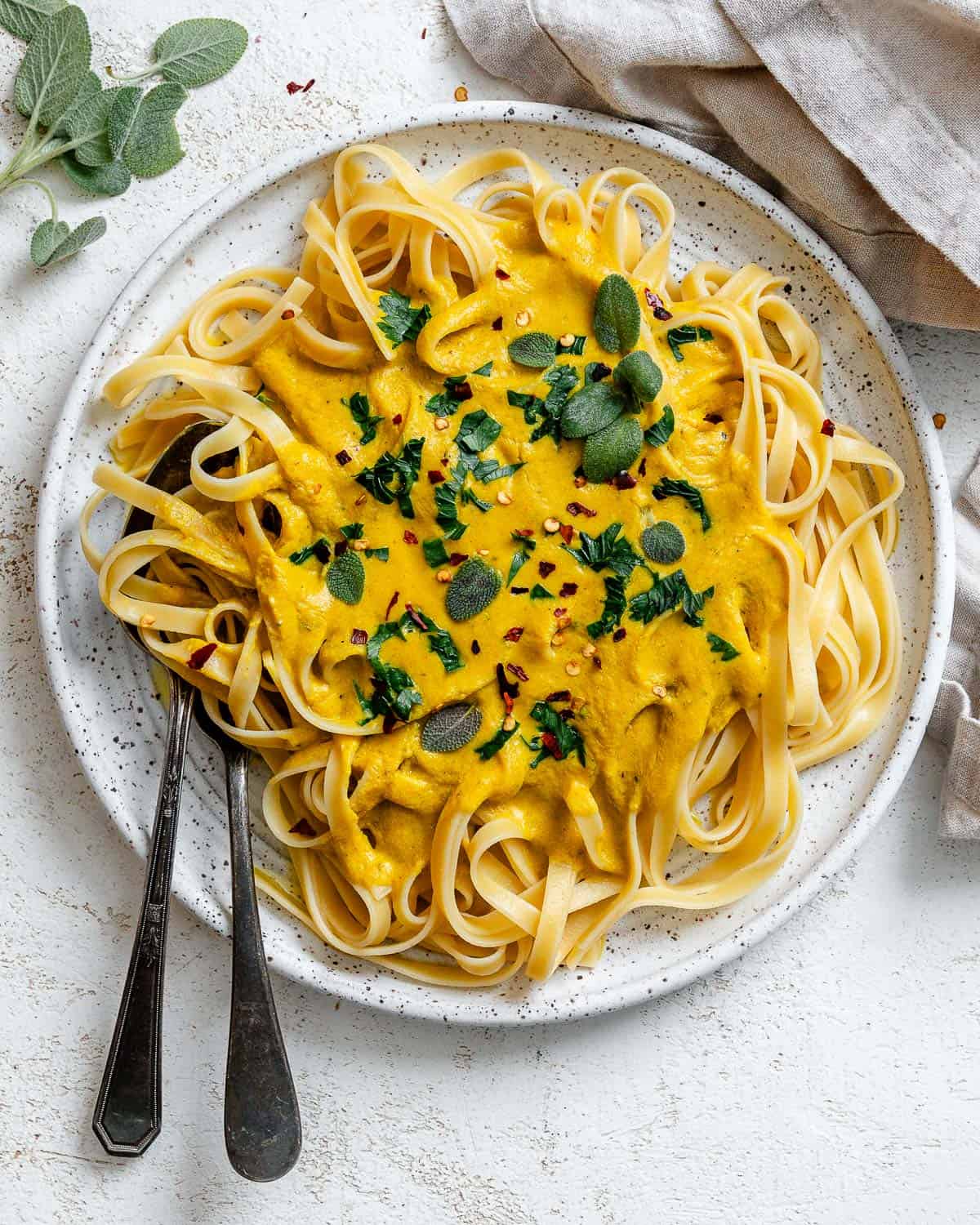 completed Creamy Pumpkin Pasta (Vegan) plated on a white plate