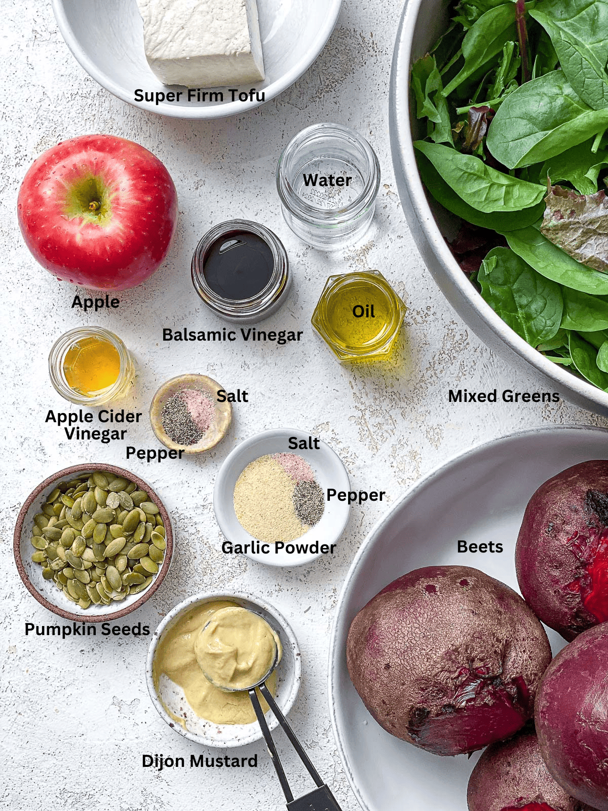 ingredients for Vegan Roasted Beet Salad (With ‘Feta’ and Apple) measured on a white surface