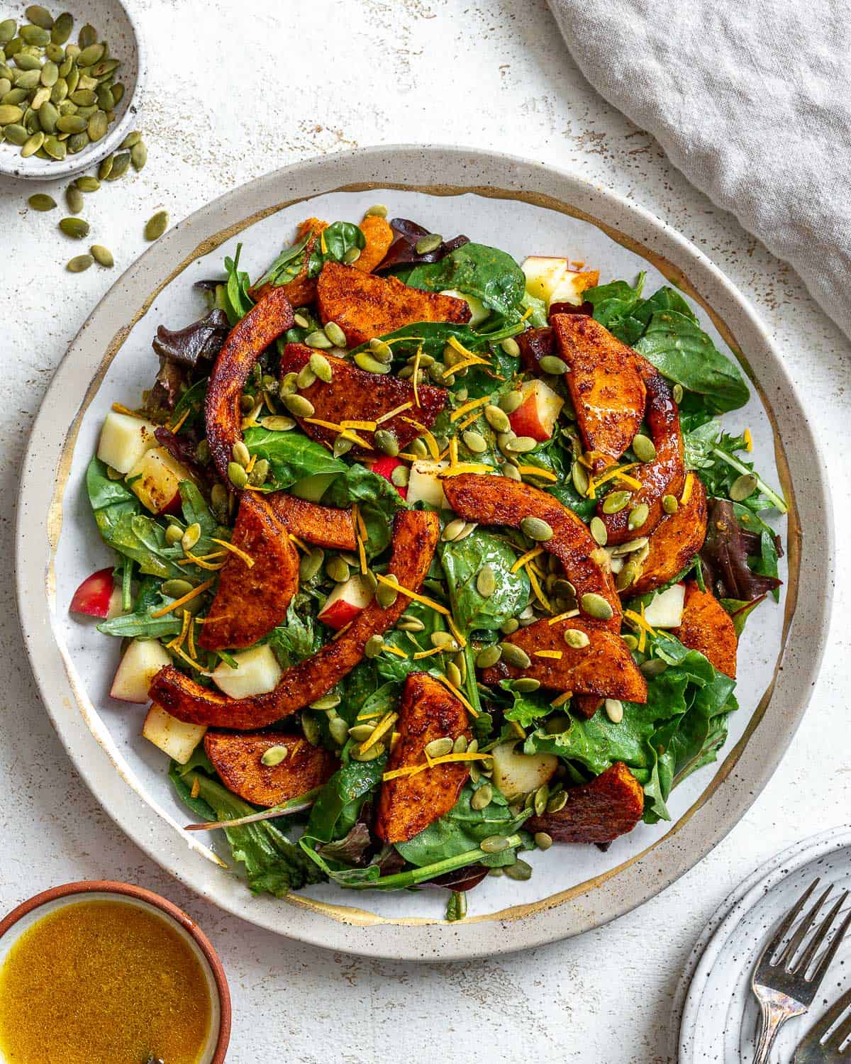 completed Easy Butternut Squash Salad on a white surface