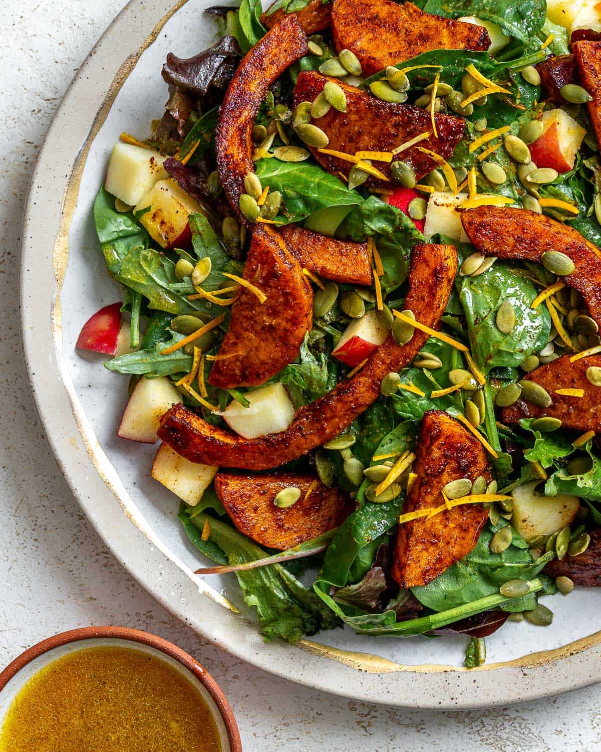 completed Easy Butternut Squash Salad on a white surface