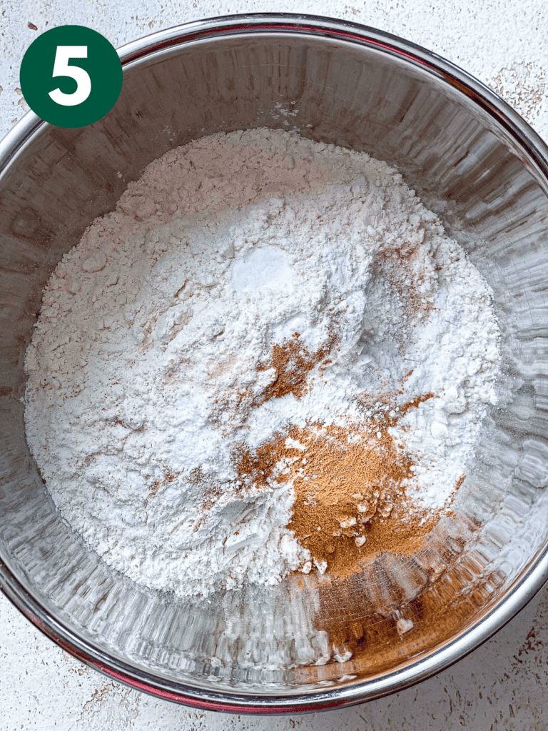 process shot of mixing dry ingredients together in a bowl