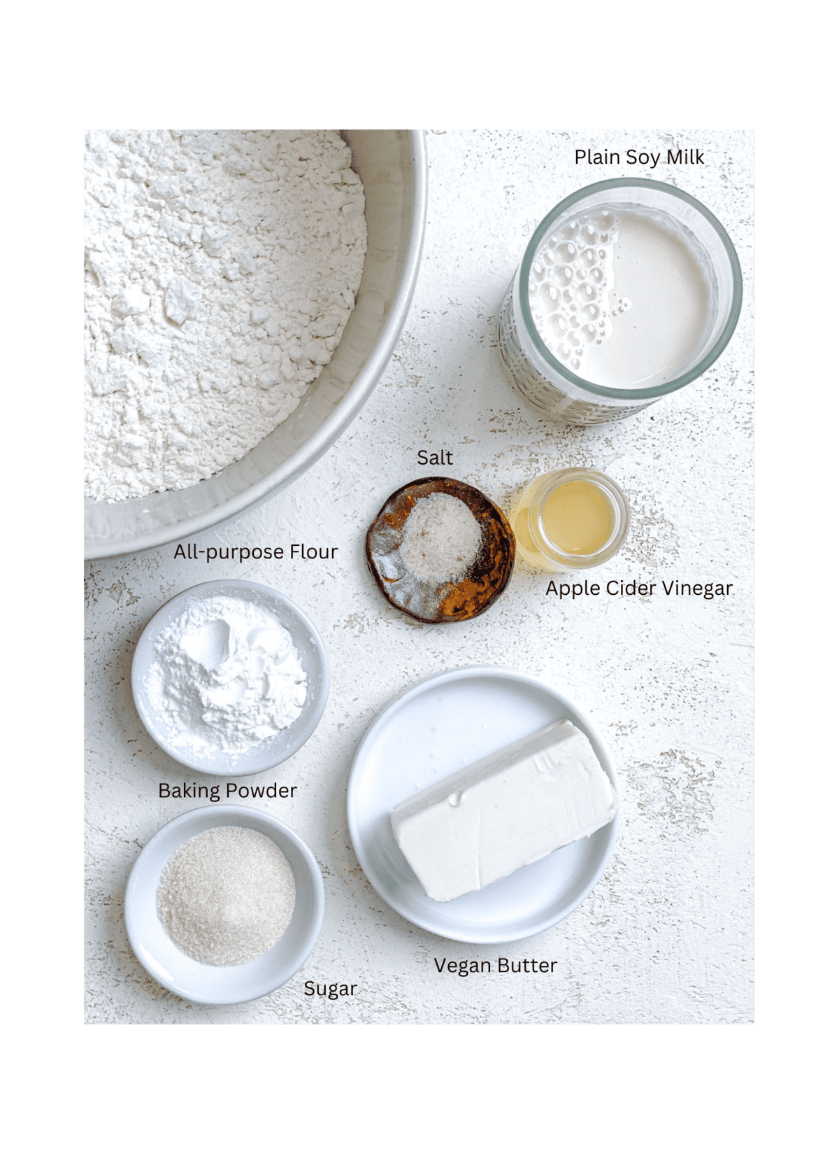 ingredients for Quick and Easy Vegan Biscuits measured against a white background