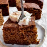 completed Vegan Gingerbread Cake slices on a white surface