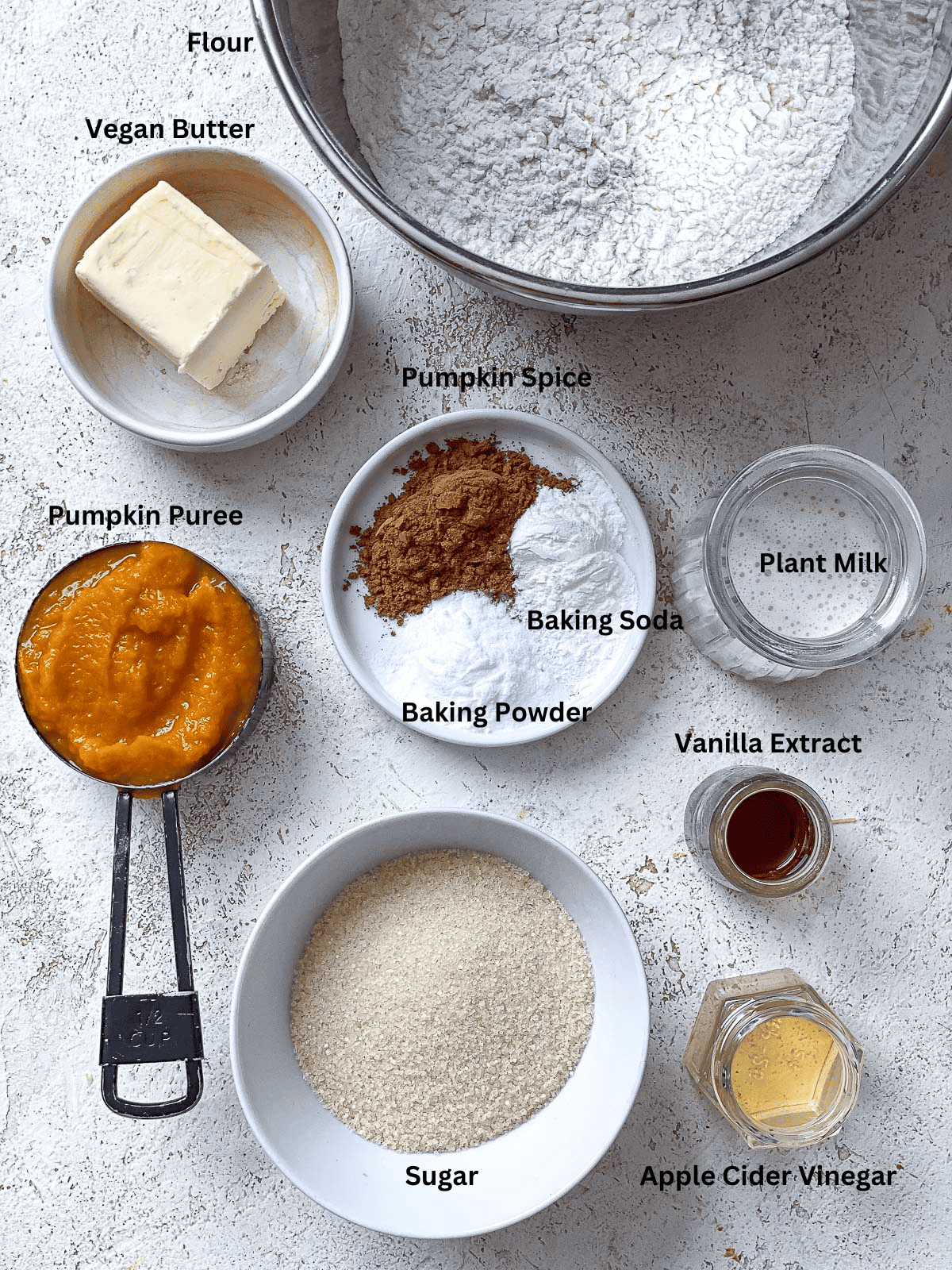 ingredients for Vegan Pumpkin Scones on a white surface