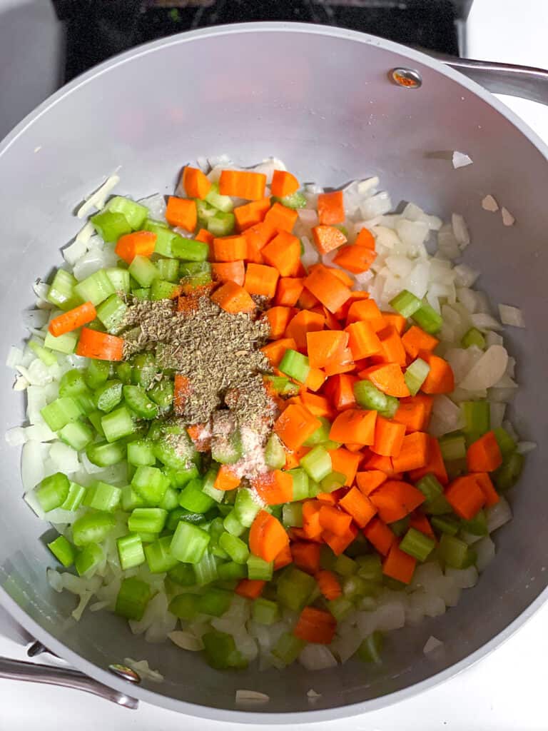 process shot showing veggies in a pot