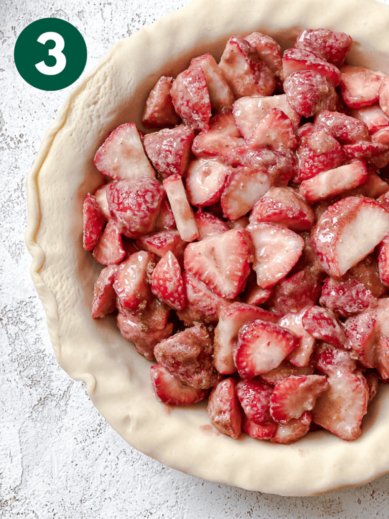 process s،t of adding strawberry filling to pie crust