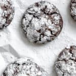 completed Vegan Chocolate Crinkle Cookies on a white surface