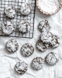 completed Vegan Chocolate Crinkle Cookies on a white surface