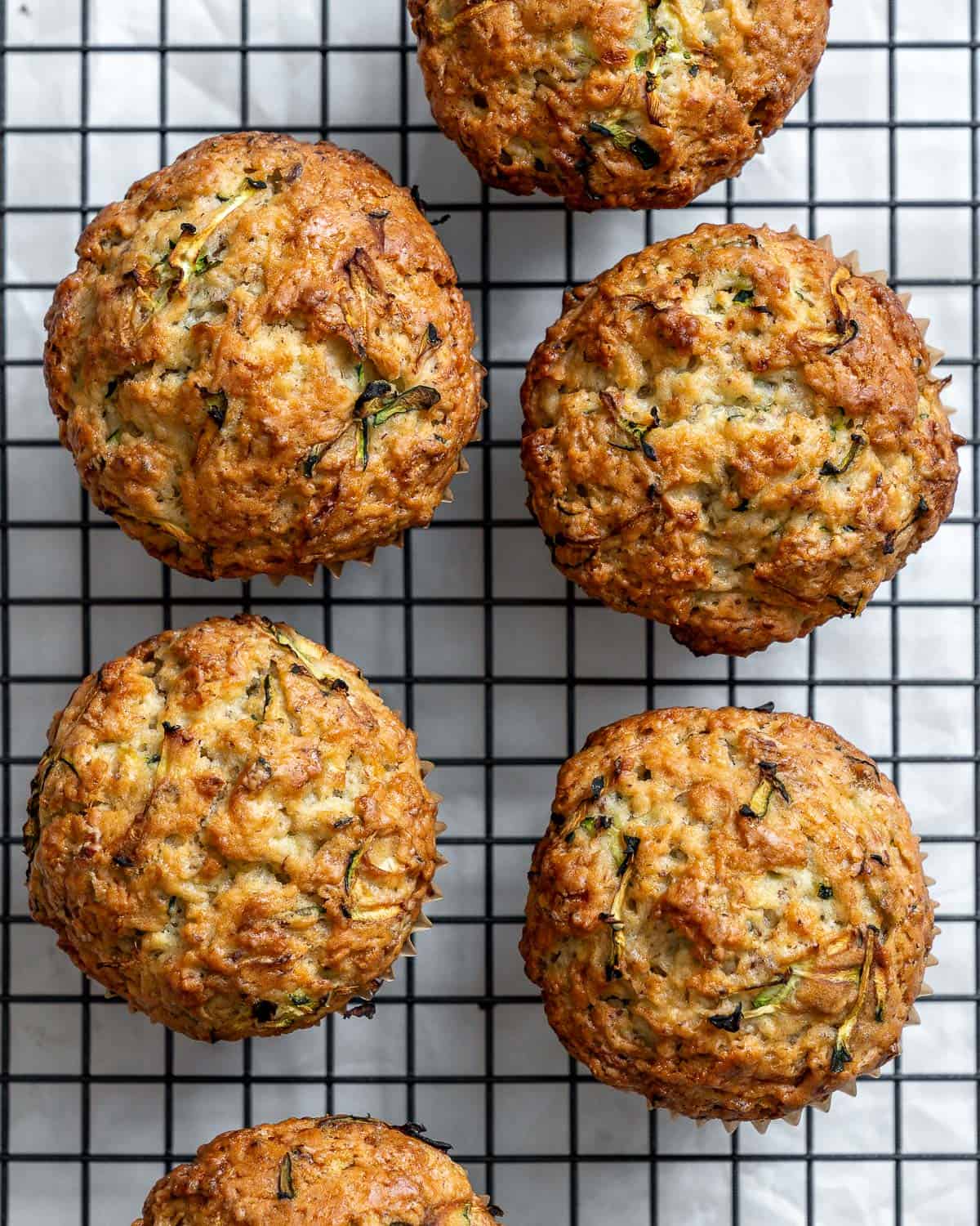 completed Easy Vegan Zucchini Muffins on cooling rack