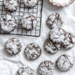 completed Vegan Chocolate Crinkle Cookies on a white surface