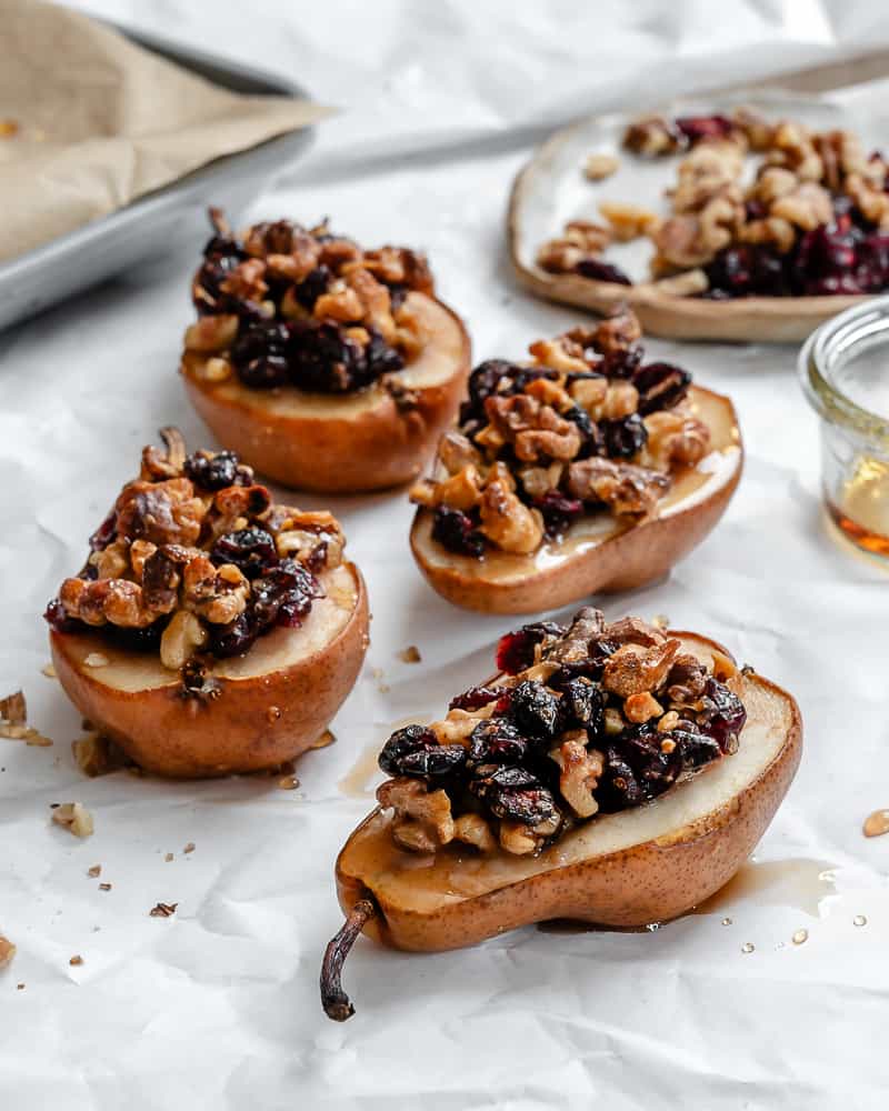 completed Easy Baked Pears [Stuffed with Nuts and Fruit] on a white surface