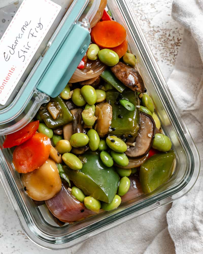 completed Quick Vegetable and Edamame Stir-Fry in a storage container