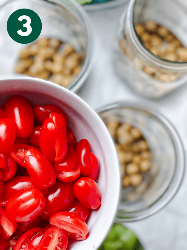process s،t of adding cherries to jars