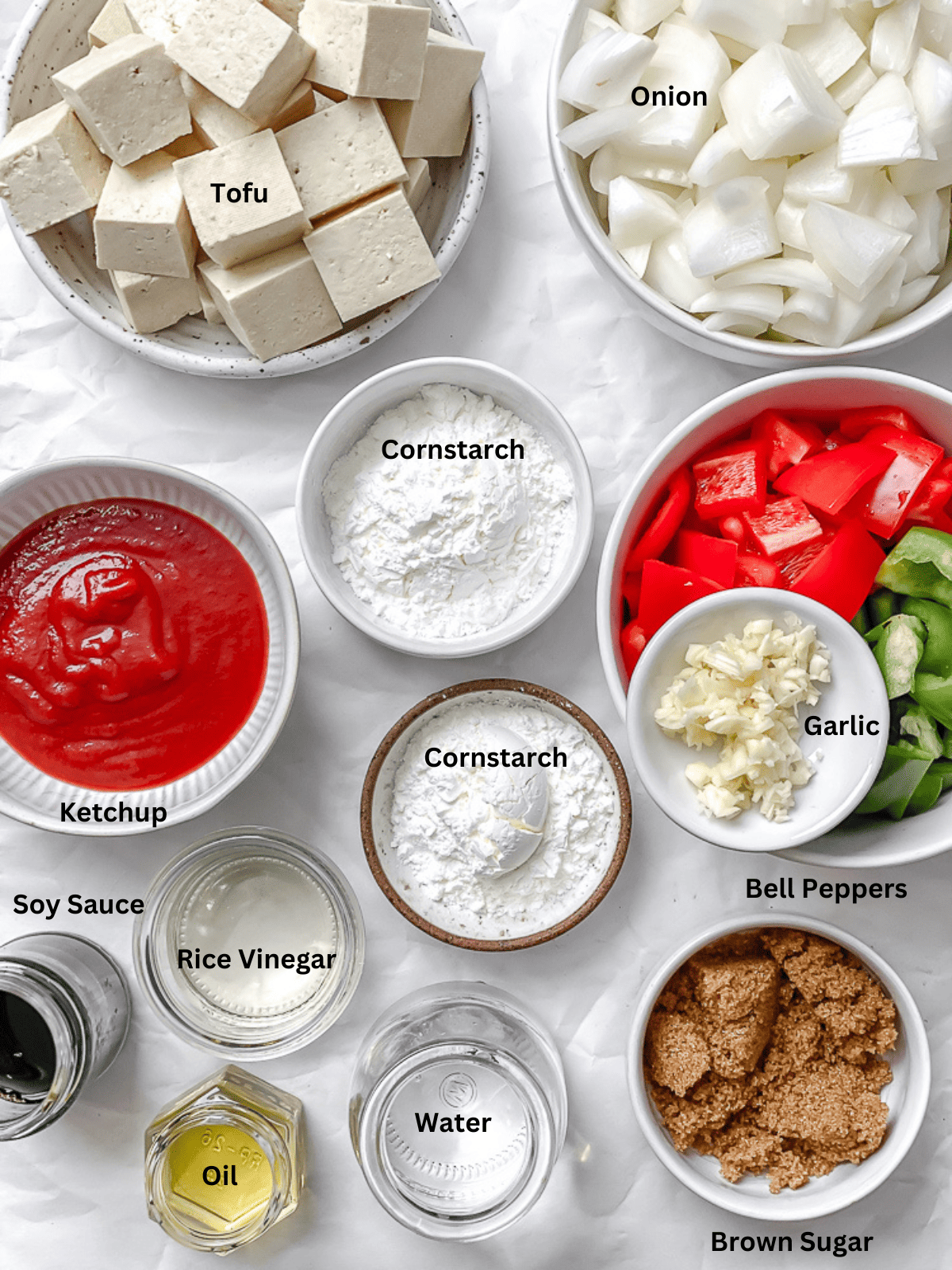 ingredients for Sweet and Sour Tofu on a white surface