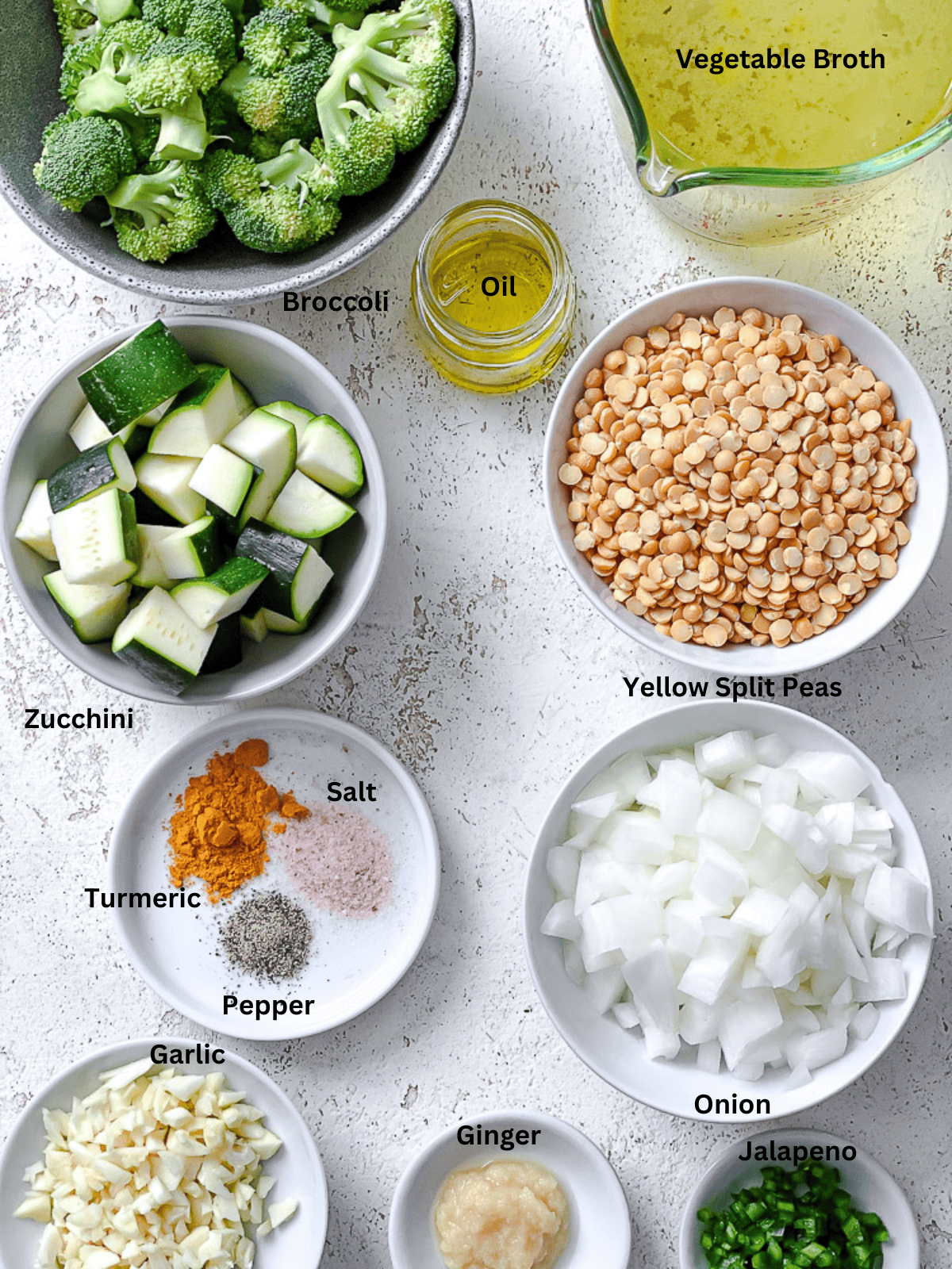 ingredients for Veggie Turmeric Yellow Split Peas on a white surface