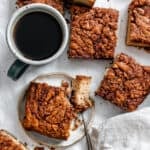 completed Vegan Coffee Cake in squares on white surface
