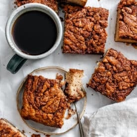 completed Vegan Coffee Cake in squares on white surface