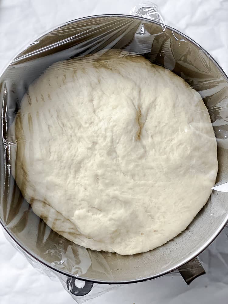 process shot showing dough in bowl