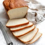 completed Basic Sandwich Bread slices on a white surface