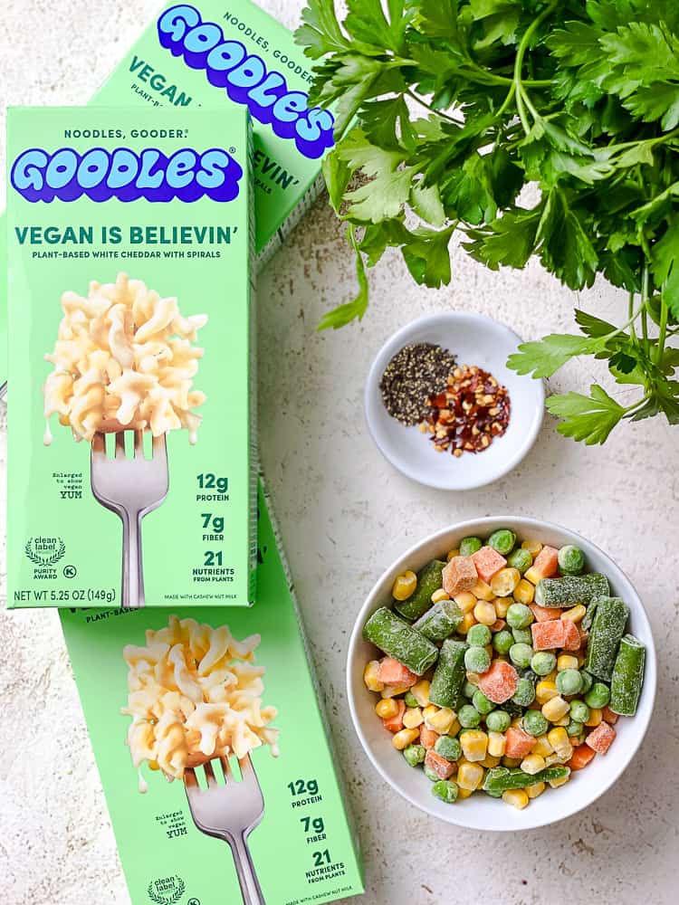 ingredients for Goodles Vegan Mac and Cheese on a white surface