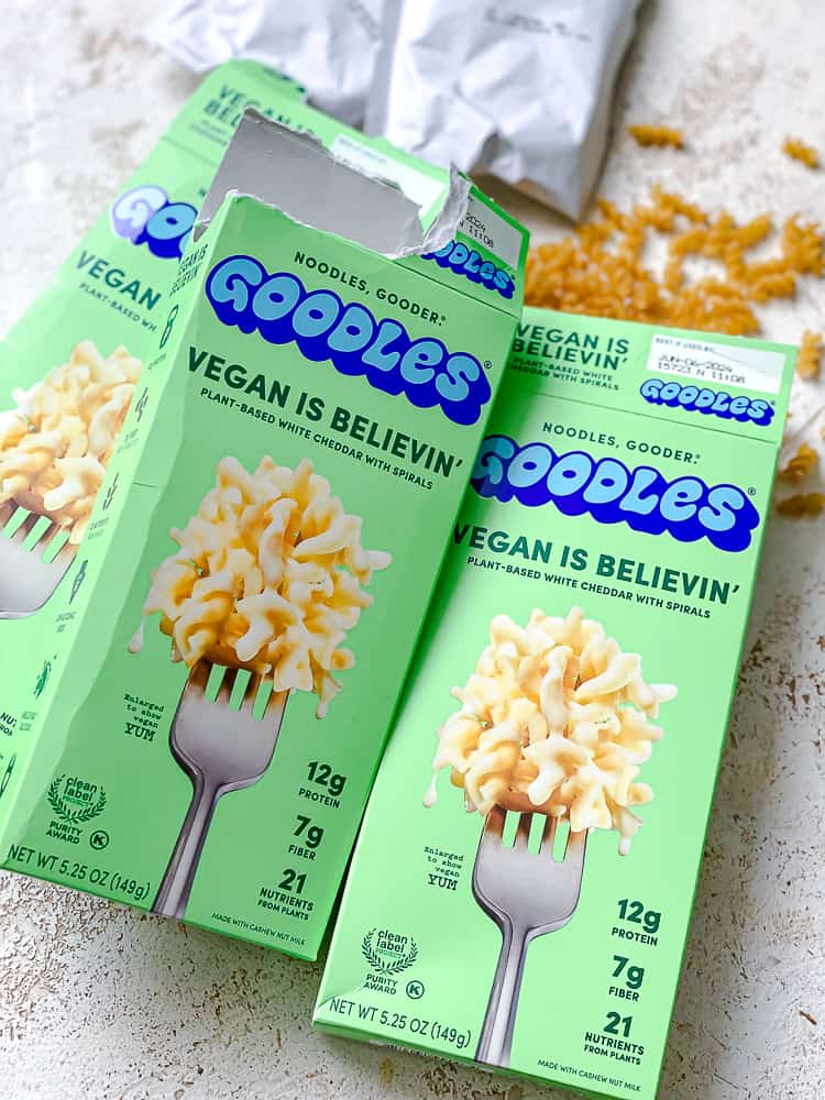 two boxed of Goodles Vegan Mac and Cheese on a white surface