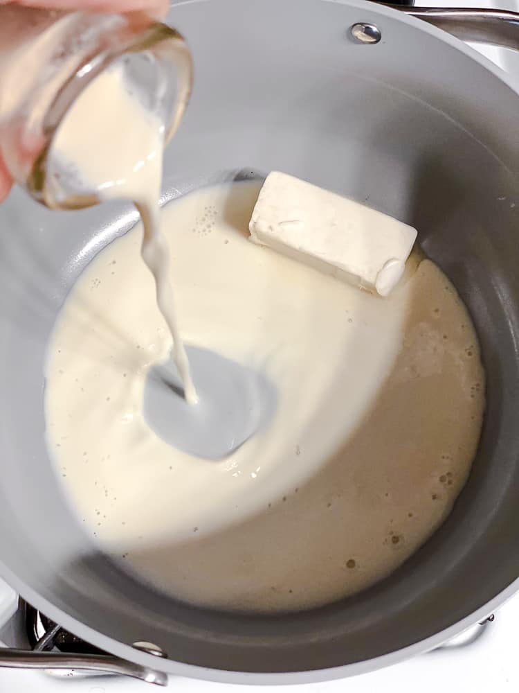 process shot of adding plant-based milk to pot