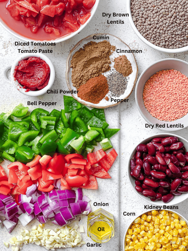 ingredients for Lentil Bean Chili on a white surface