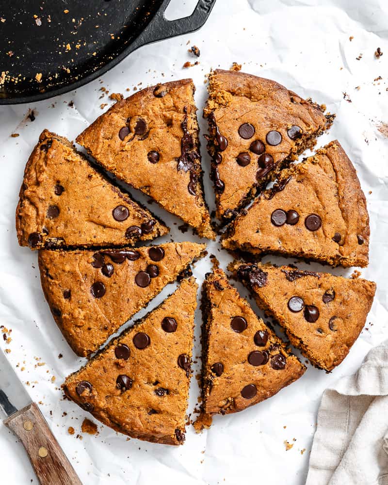 a sliced skillet chocolate chip cookie.