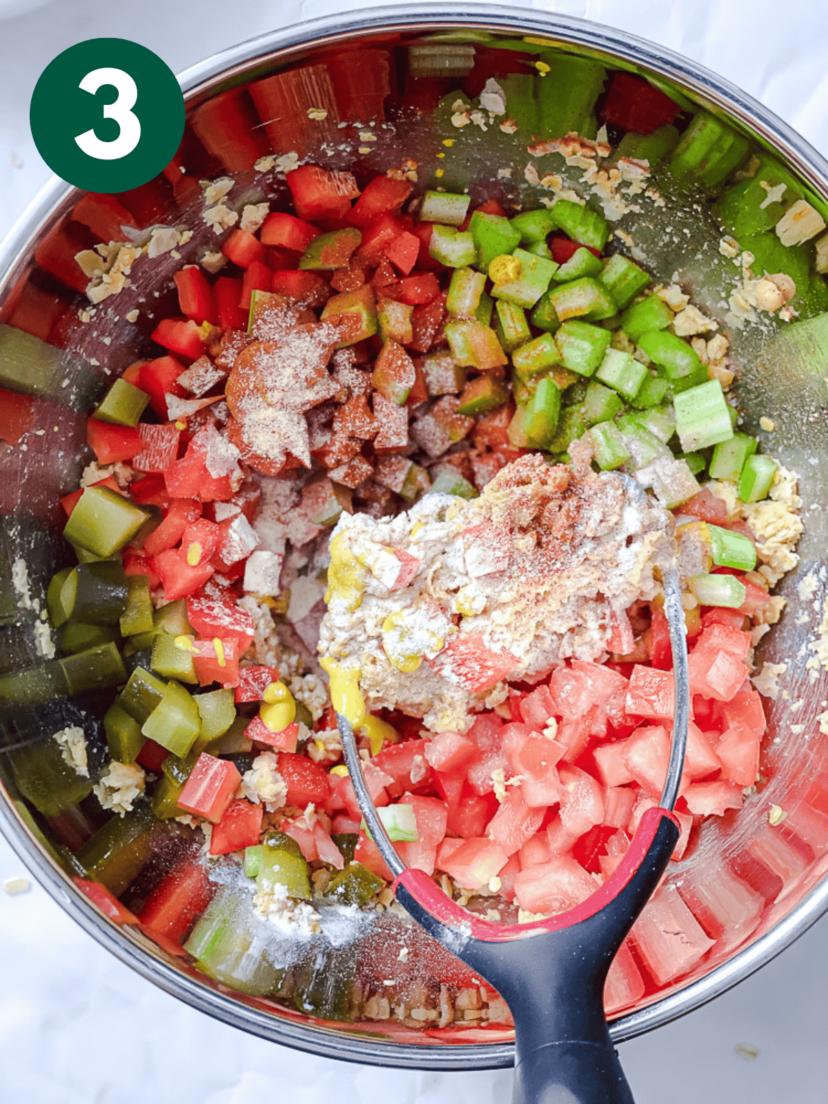 process shot of mixing ingredients in a bowl